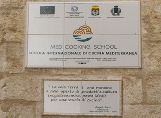 Targa d'ingresso alla Scuola Alma Med Cooking School